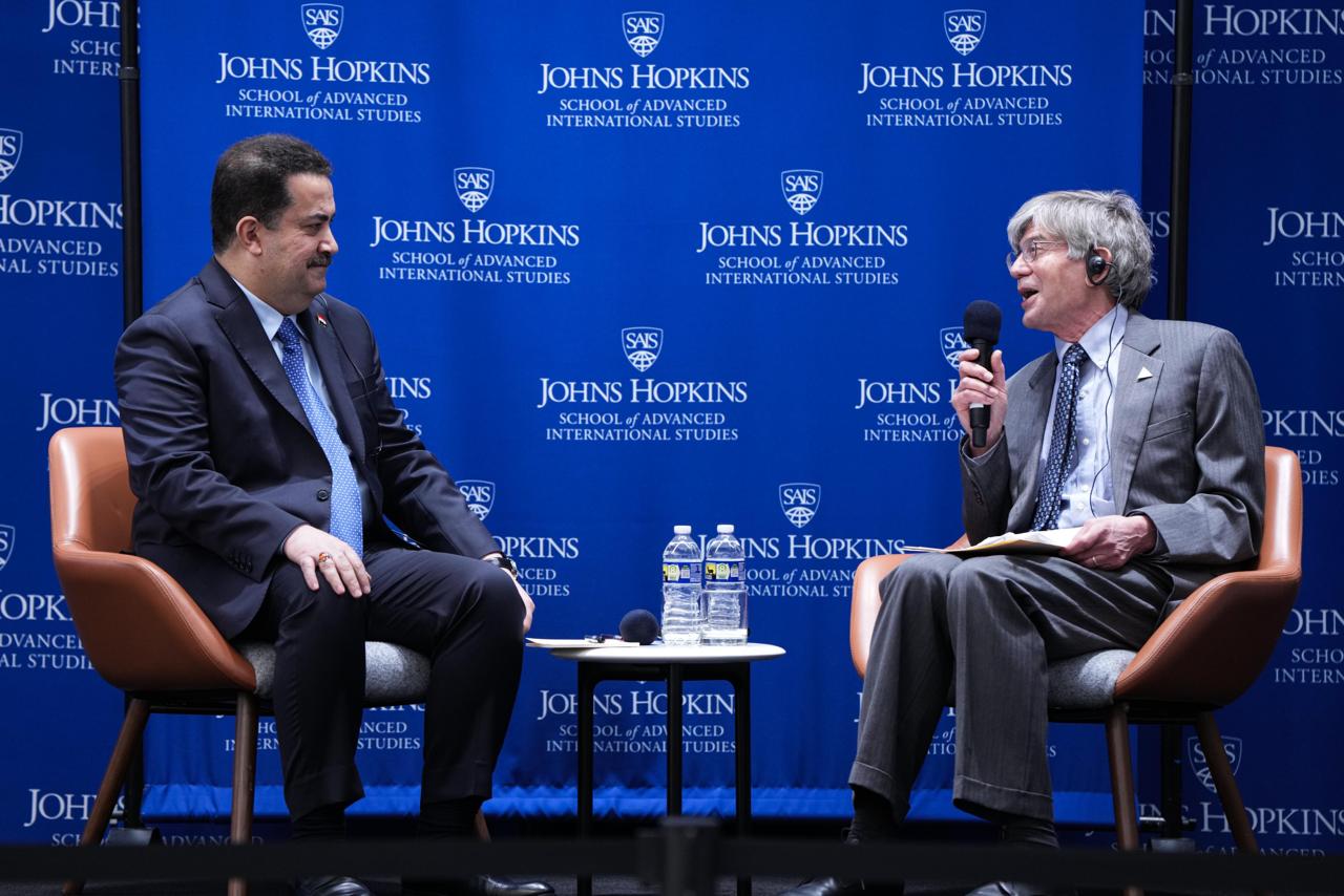 PM, Muhammad Shiaa Al-Sudani (left), hosted by Johns Hopkins University