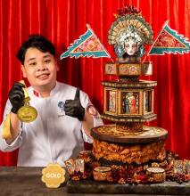 Nguyen Huu Thien An and his "Hy su hat boi" masterpiece (Photo courtesy of An)
