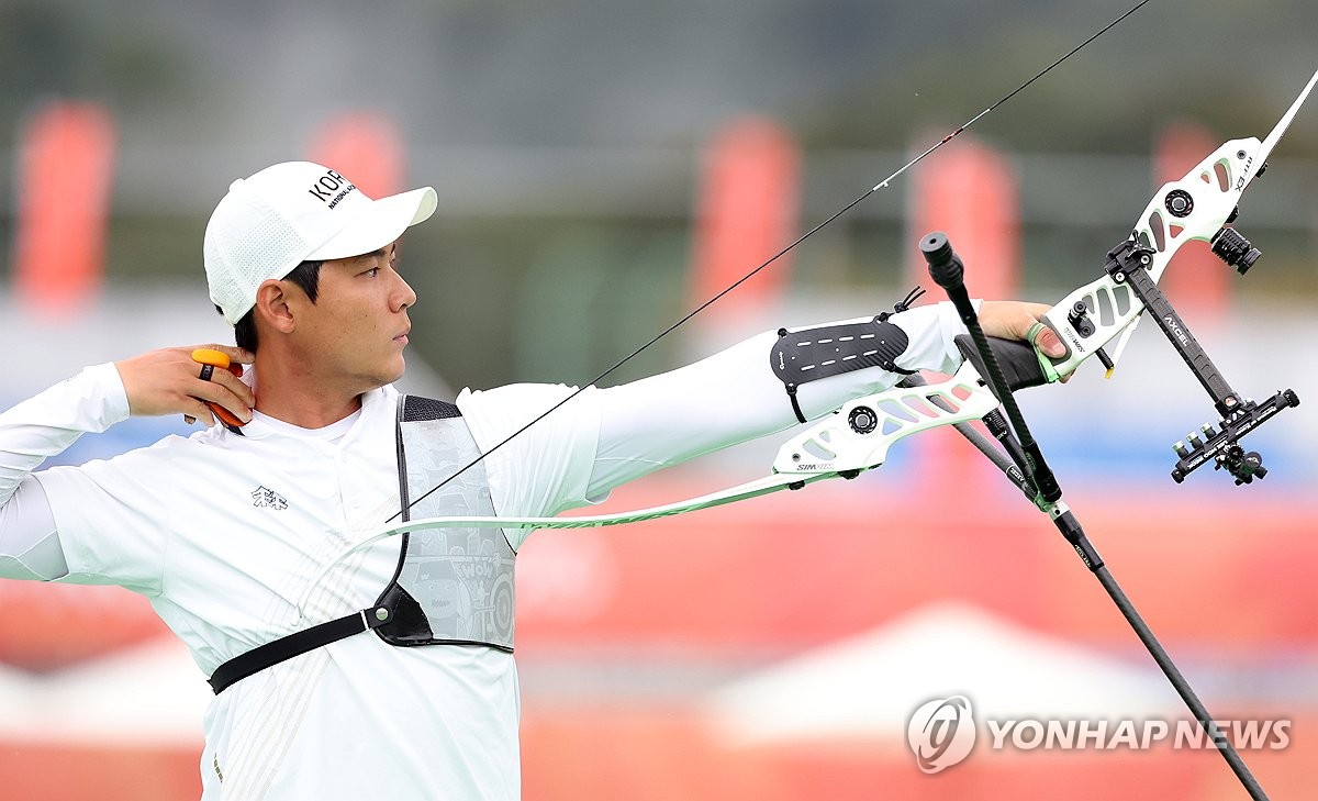 Lee Woo-seok of South Korea shoots an arrow during a round of 16 men's individual recurve archery match against Reza Shabani of Iran at the Aichi-Nagoya Asian Games at the Chuo Sogo Park Multipurpose Square in Okazaki, Aichi Prefecture, central Japan, on Sept. 29, 2026. (Yonhap) (END)