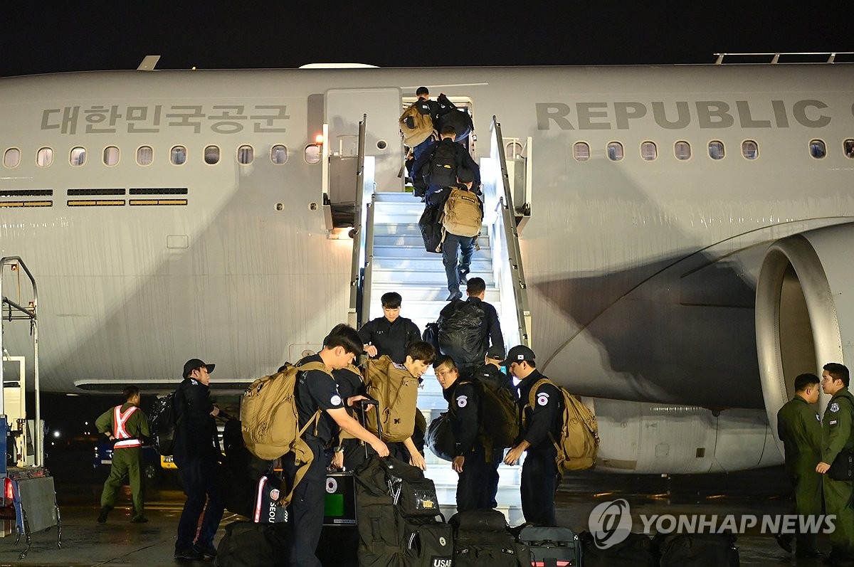 Members of a South Korean disaster relief team board a KC-330 Cygnus multirole tanker transport aircraft at Seoul Airport in Seongnam, south of Seoul, on Sept. 2, 2026, prior to their departure for Nepal to support search, rescue and other relief efforts following devastating floods, in this photo released by the defense ministry. The Korea Disaster Relief Team consists of 44 personnel from the foreign ministry, the Korea International Cooperation Agency, fire authorities and other agencies. (PHOTO NOT FOR 