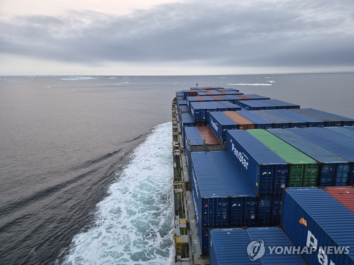 The PanStar Acro, a 2,800-TEU container ship with ice-breaking capability suited to polar navigation, sails in the Arctic Ocean on Aug. 31, 2026, with floating ice seen in front of the ship, as it makes South Korea's first trial voyage to reach Rotterdam in the Netherlands via the Arctic route, in this photo released by the oceans and fisheries ministry. (PHOTO NOT FOR SALE) (Yonhap) (END)