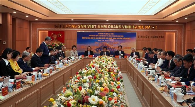 At the theoretical exchange between the CPV and JCP on August 2. (Photo: VNA)