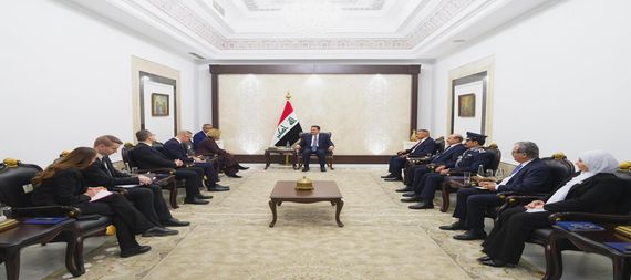 PM, Mohammed Shia Al-Sudani (center), the Ambassador of the Kingdom of Belgium to Iraq, Serge Dickschen (left)