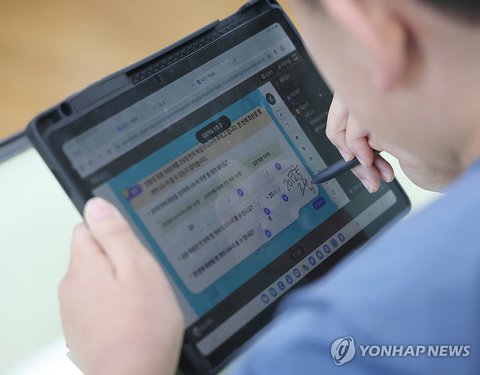 Demonstration of class with digital textbooks