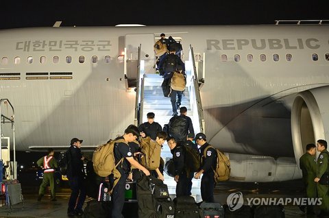 Members of a South Korean disaster relief team board a KC-330 Cygnus multirole tanker transport aircraft at Seoul Airport in Seongnam, south of Seoul, on Sept. 2, 2026, prior to their departure for Nepal to support search, rescue and other relief efforts following devastating floods, in this photo released by the defense ministry. The Korea Disaster Relief Team consists of 44 personnel from the foreign ministry, the Korea International Cooperation Agency, fire authorities and other agencies. (PHOTO NOT FOR 