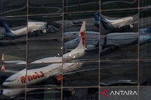 Several aircraft are parked at Soekarno-Hatta International Airport in Banten, Indonesia.