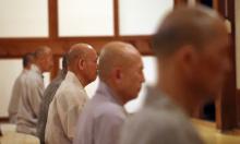 This file photo shows monks practicing seated meditation. (Yonhap)