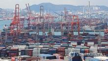 Containers are stacked at a port in the southeastern city of Busan on Nov. 29, 2024. (Yonhap)