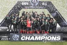 In this file photo from Dec. 18, 2019, South Korean players celebrate after winning the East Asian Football Federation (EAFF) E-1 Football Championship with a 1-0 win over Japan at Busan Asiad Main Stadium in Busan, about 325 kilometers southeast of Seoul. (Yonhap)