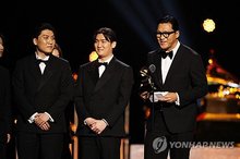 This Reuters photo shows composers of the "KPop Demon Hunters" soundtrack, who won Best Song Written for Visual Media at the 68th Grammy Awards in Los Angeles for "Golden" on Feb. 1, 2026. (PHOTO NOT FOR SALE) (Yonhap)