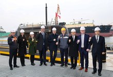 This file photo taken Feb. 2, 2026, provided by Hanwha Ocean Co., shows Stephen Fuhr (5th from L), Canada's secretary of state for defense procurement, Hanwha Ocean CEO Kim Hee-cheul (6th from L) and other officials posing for a photo after visiting Hanwha Ocean's shipyard in Geoje, about 330 kilometers southeast of Seoul. (PHOTO NOT FOR SALE) (Yonhap)