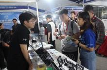 Representatives from enterprises at the Hanoi Semiconductor Investment Festival 2024. (Photo: VNA)