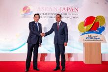 TOKYO, Dec 17 -- Malaysian Prime Minister Anwar Ibrahim (right) shaking hands with Japanese Prime Minister Fumio Kishida during the ASEAN-Japan Commemorative Summit here on Sunday.  The summit marks the 50th anniversary of ASEAN-Japan Friendship and Cooperation which highlights the strategic relationship between Japan and much of Southeast Asia represented by ASEAN.  Anwar arrived in Tokyo Friday night for a five-day working visit.  -- fotoBERNAMA (2023) COPYRIGHT RESERVED