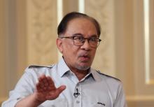 PUTRAJAYA, May 1 -- Malaysian Prime Minister Anwar Ibrahim answering questions during the "Soal Jawab Perdana Menteri" programme at Seri Perdana Wednesday.  --fotoBERNAMA (2024) COPYRIGHT RESERVED