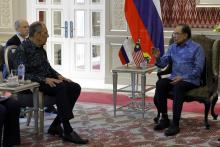 Malaysian Prime Minister Anwar Ibrahim (right) and Russian Foreign Minister Sergey Lavrov at the Seri Perdana on Sunday.