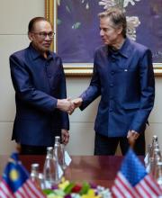 Anwar Ibrahim (left) and  Antony Blinken (right)
