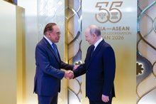 Prime Minister Datuk Seri Anwar Ibrahim (left) shakes hands with Russian President Vladimir Putin before the ASEAN-Russia Commemorative Summit Gala Dinner at the Gallery Area of the Tatar State Academic Theatre