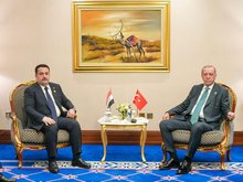 Turkish President Recep Tayyip Erdoğan (right), PM, Mohammed Shia Al-Sudani (left)