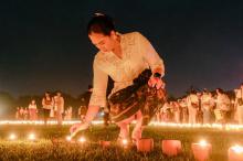 Deputy Minister of Tourism Ni Luh Puspa lights an oil lamp (dipa) during the Mahashivaratri ceremony at the Prambanan Temple complex in Sleman, Yogyakarta, Feb 15, 2026. (ANTARA)