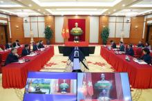 General Secretary of the CPV Central Committee To Lam talks over the phone with General Secretary of the LPRP Central Committee and President of Laos Thongloun Sisoulith on December 1. (Photo: VNA)