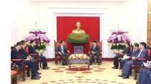 At the meeting between Politburo member and Permanent member of the Communist Party of Vietnam Central Committee's Secretariat Luong Cuong (right) and newly-appointed Chinese Ambassador to Vietnam He Wei. (Photo: VNA)