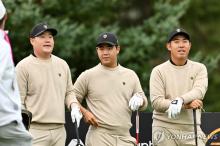 In this Getty Images photo, South Korean players Im Sung-jae, Tom Kim and An Byeong-hun (L to R) look on during a practice round for the International Team ahead of the Presidents Cup at Royal Montreal Golf Club in Montreal on Sept. 24, 2024. (Yonhap)