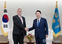 President Yoon Suk Yeol (R) shakes hands with Czech National Security Adviser Tomas Pojar during their meeting at the presidential office in Seoul on Sept. 4, 2024, in this photo provided by Yoon's office. (PHOTO NOT FOR SALE) (Yonhap)