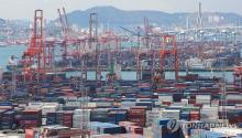 Containers are stacked at a port in the southeastern city of Busan, in this file photo taken Nov. 29, 2024. (Yonhap)