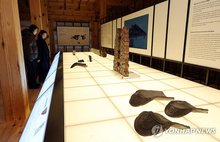 A special exhibition on Gwanwoldang, a building believed to be a royal shrine from the Joseon Dynasty (1392-1910), is held in Seoul on Dec. 23, 2025. The Korea Heritage Service and the Overseas Korean Cultural Heritage Foundation announced that they had received parts of the structure under an agreement reached a day ago with Kotoku-in, a Buddhist temple in Kamakura, Japan. (Yonhap)