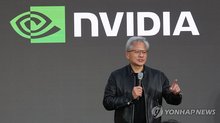 Nvidia CEO Jensen Huang (L) speaks during the Korea AI Ecosystem Reception in Seoul on June 8, 2026. (Pool photo) (Yonhap)