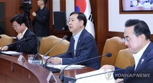 Finance Minister Koo Yun-cheol (C) speaks during a meeting with economy-related ministers in Seoul on June 19, 2026. (Yonhap)
