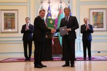 Prime Minister Anwar Ibrahim (right), together with Turkmenistan President Serdar Berdimuhamedow (left) witness the exchange of Memorandum of Understanding documents between Foreign Minister Mohamad Hasan (right) and Turkmenistan's Minister of Culture Atageldi Shamyradov at the Perdana Putra Building on Thursday.