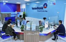 Tide of soured debts will continue to hit Vietnamese commercial banks in 2024, according to experts. (Photo:  VNA)