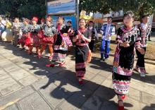 KUNMING, June 21 -- More than 100 Yunnan Minzu University students dressed in ethnic attire representing all 56 ethnic groups acknowledged by the Chinese government greeted the arrival of writers and participants during the China Asia Pacific Press Centre programme.