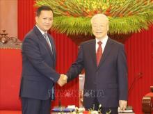 Party General Secretary Nguyen Phu Trong (R), and Prime Minister and Vice President of the Cambodian People's Party (CPP) Samdech Moha Borvor Thipadei Hun Manet. (Photo: VNA)