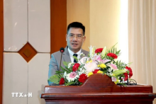 Nguyen Van Trung, Vietnamese Consul General in Pakse, Champasak province of Laos, speaks at the forum. (Photo: VNA)
