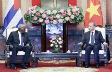 Vietnamese President To Lam (right) receives President of the National Assembly (NA) of People's Power of Cuba Esteban Lazo Hernandez in Hanoi on Wednesday. (Photo: VNA)