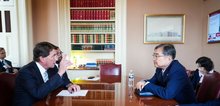 South Korean Foreign Minister Cho Hyun (front, R) listens to U.S. Republican Sen. Bill Hagerty of Tennessee during their meeting in Washington on Sept. 17, 2026, in this photo provided by the foreign ministry. (PHOTO NOT FOR SALE) (Yonhap)