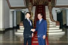Chairman of the Ho Chi Minh City People’s Committee Phan Van Mai (R) and Hyogo Governor Saito Motohiko. (Photo: VNA)