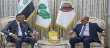 President of the Iraqi Journalists Syndicate, head of the Federation of Arab Journalists, Moaid Al-Lami (right) the Ambassador of the State of Palestine to Iraq, Ahmad Al-Ruwaidi (left)