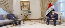 Speaker of the Iraqi Parliament, Mahmoud Al-Mashhadani (right), the Ambassador of the State of Palestine in Baghdad, Ahmed Al-Ruwaidi (left) 