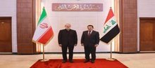 Iraq’s National Security Advisor, Qasim al-Araji (right), the Secretary of Iran’s Supreme National Security Council, Ali Larijani (left)