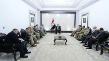 PM, Mohammed Shia Al-Sudani (centre) the new Commander of the (CENTCOM), Admiral Brad Cooper, (left) and his accompanying delegation