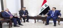 PM, al-Sudani (left) receives the head of the Russian company Lukoil, Vagit Alekperov (right)