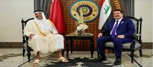 PM, Mohammed Shia al-Sudani (right), the Emir of Qatar, Tamim bin Hamad Al Thani, (left) 