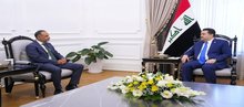 PM, Mohammed Shia Al-Sudani (right), British Ambassador to Iraq, Irfan Siddiq (left)
