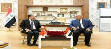 The Governor of Karbala, Nassif Jassim Al-Khattabi (right), the Consul General of Turkey in Najaf, Şenol Sevim (left)