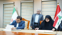 Communications Minister Hiyam Al-Yasiri (right) and her Iranian counterpart, Issa Zarepour