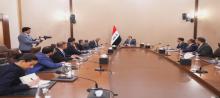 PM Mohammed al-Sudani (center) meets with a delegation from  J.P. Morgan, headed by the bank's Deputy Director, Daniel Zeljko