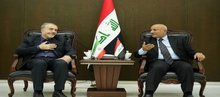 The Governor of Karbala, Nassif Jassim Al-Khattabi (right), the Vice President of the Islamic Republic of Iran, Hussein Zolfaghari (left)